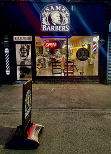 Sams Barbers at night